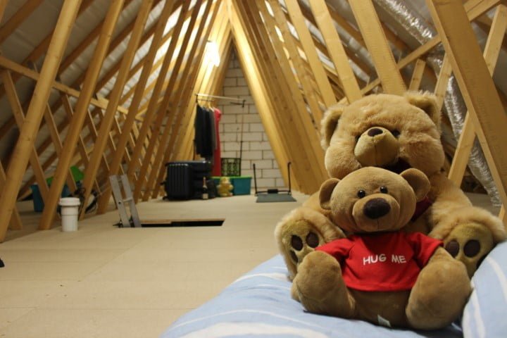 toys within a completed boarded loft