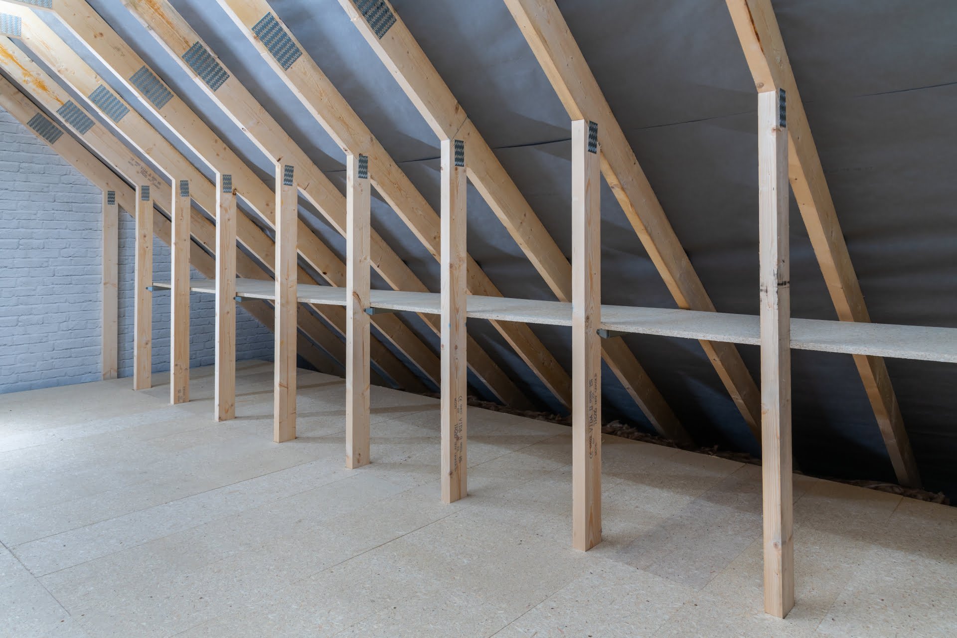 Empty boarded loft shelves